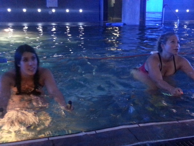 Amy Burton and Eliza Flynn pool biking at aquallure