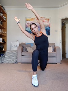 Runner's lunge with overhead lean - 3 Orangetheory Fitness Home Workouts